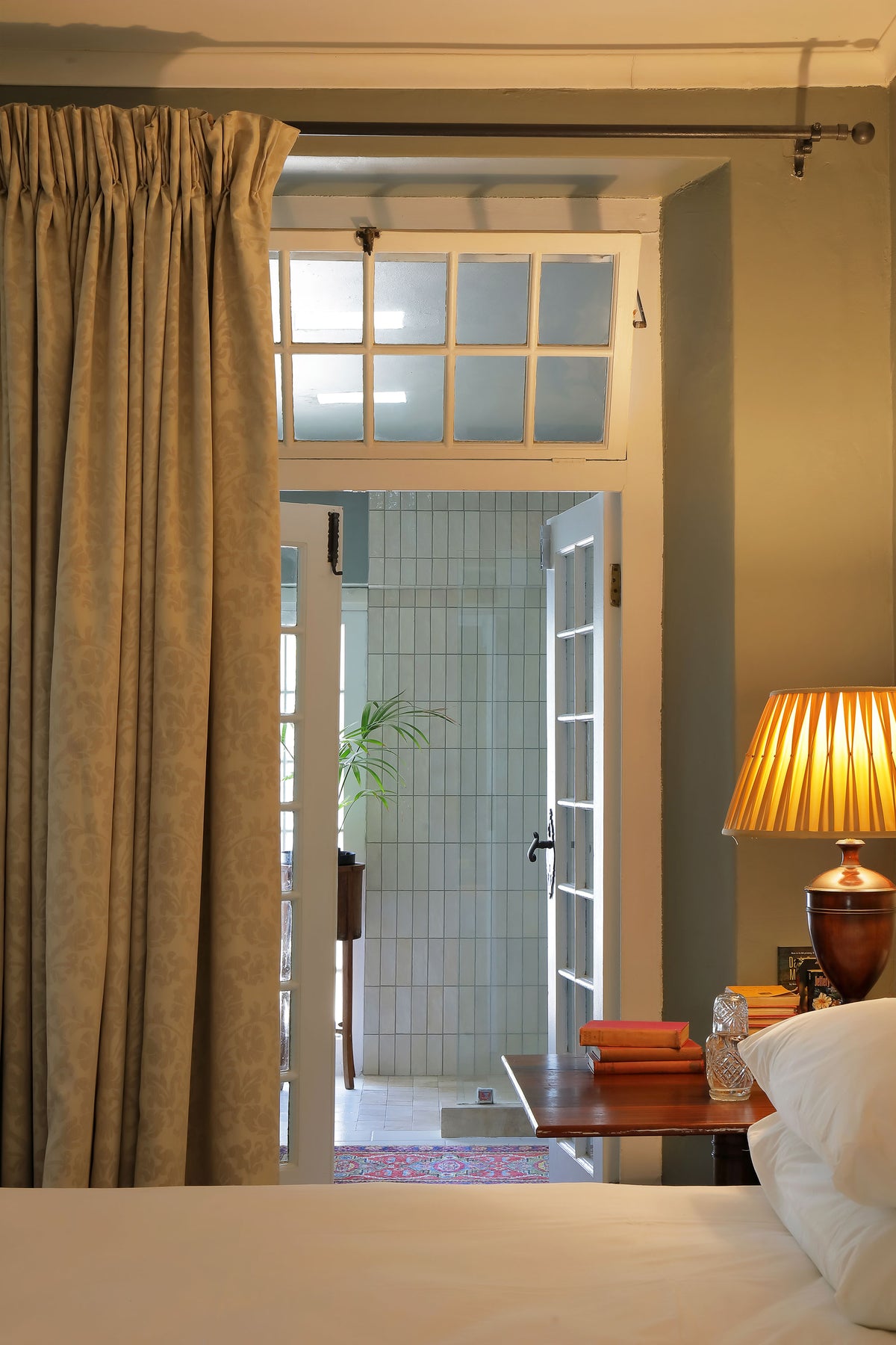 Character-filled guest bedroom inside the Manor House