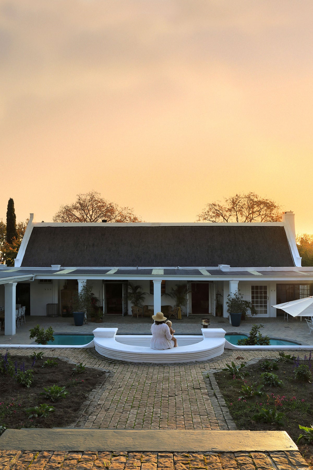 Pool and outdoor entertainment area at The Manor House