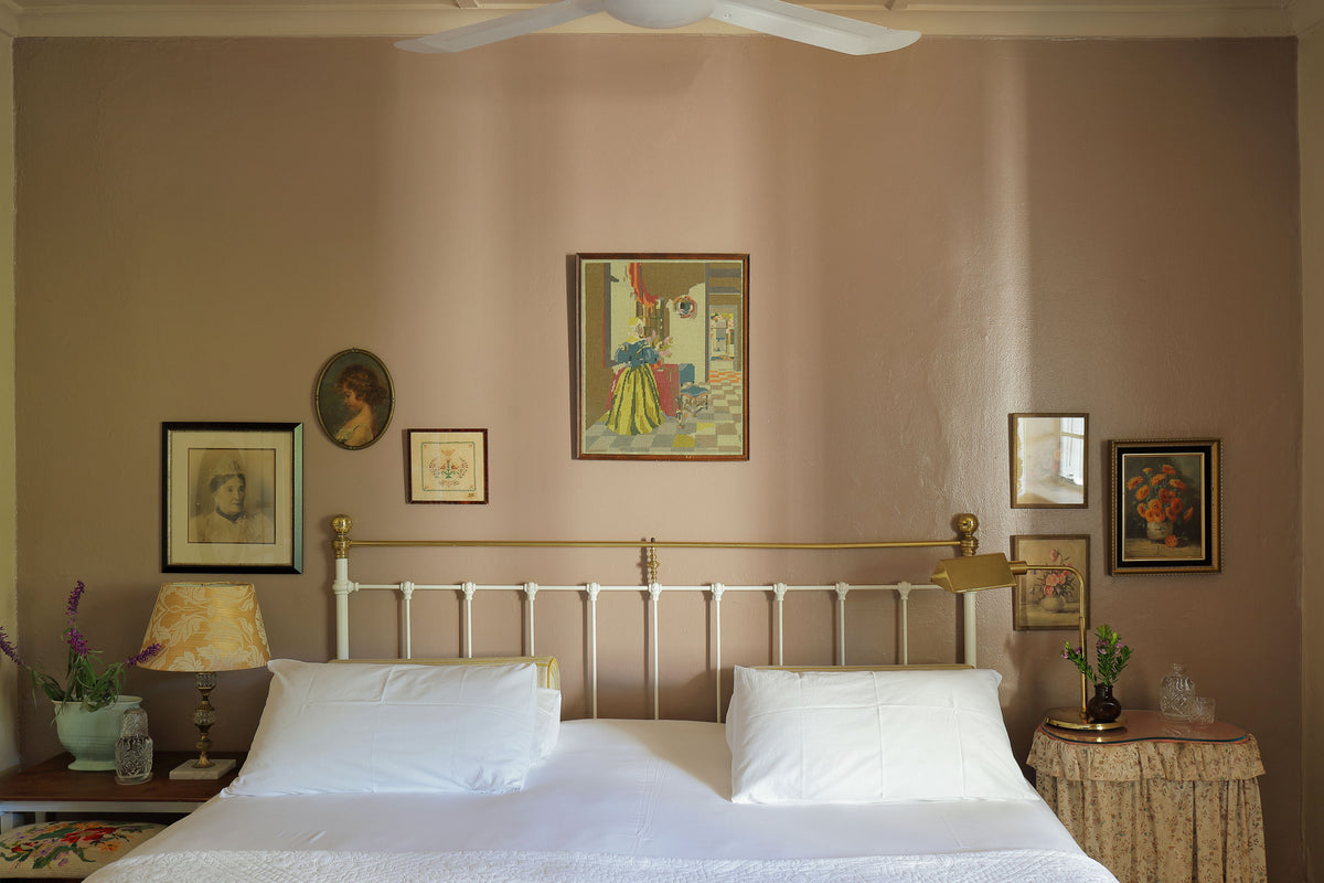 Colourful king-size bedroom inside Willow Suite
